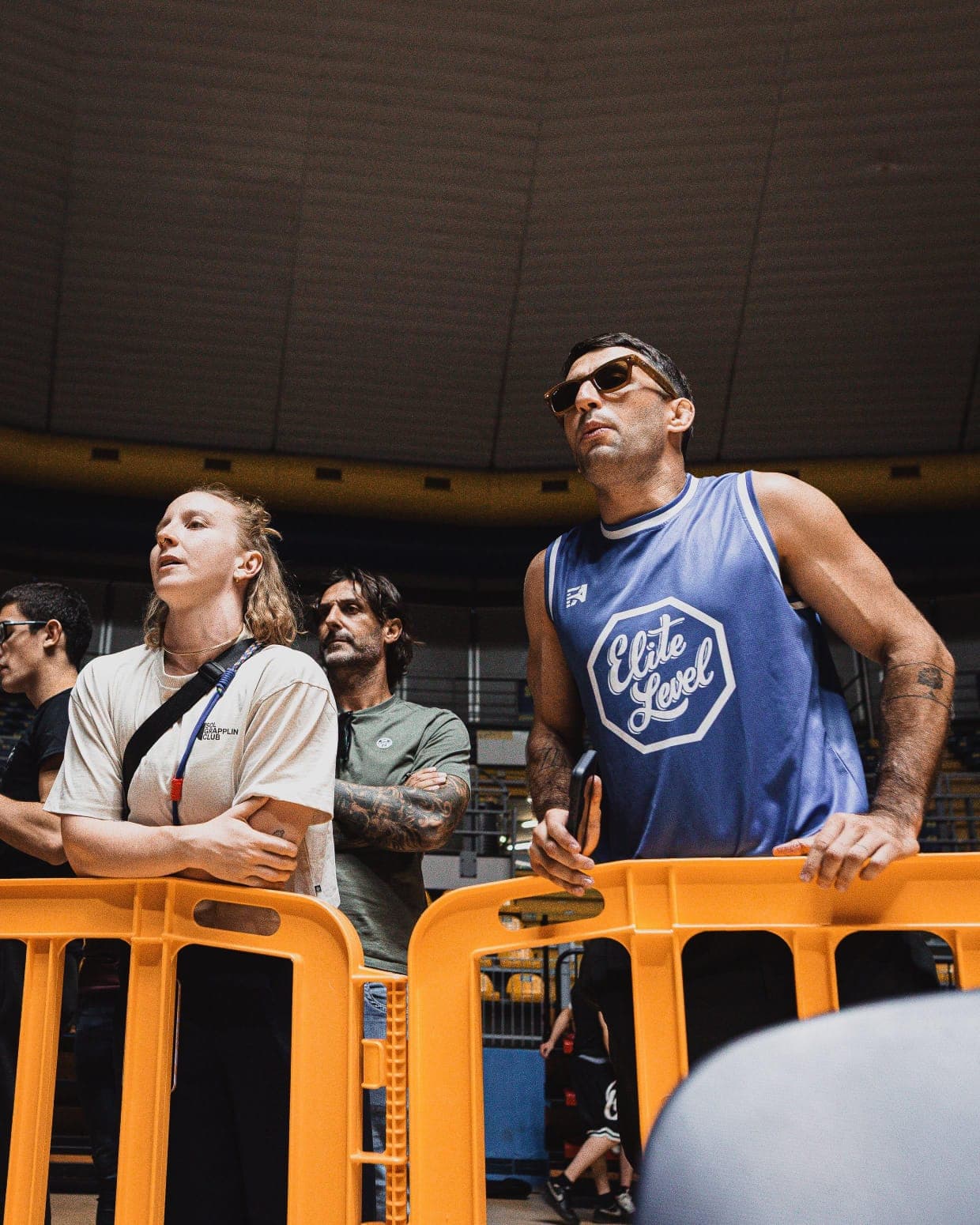 SOL Grappling coach and member watching a match ringside at a competition